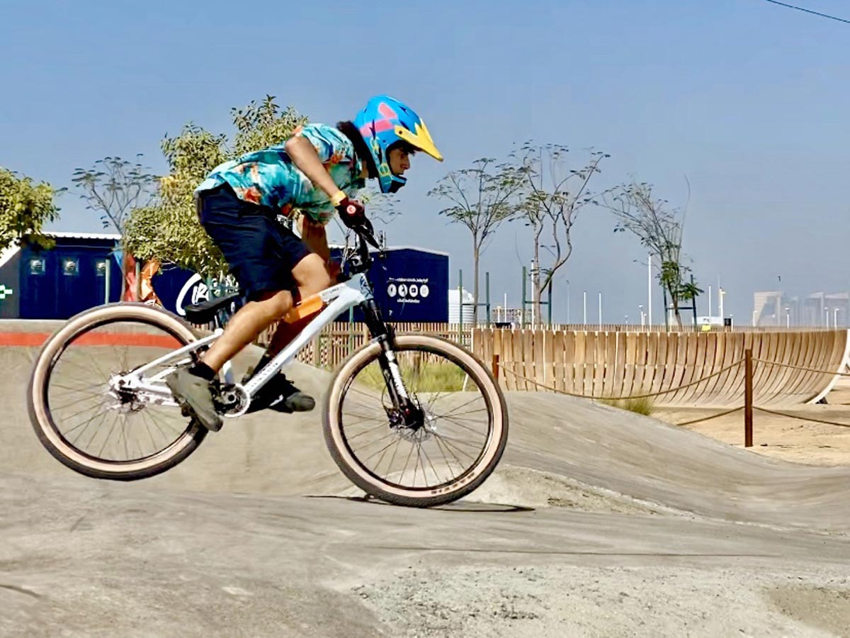 BMX biker speeds by at Circuit X Games