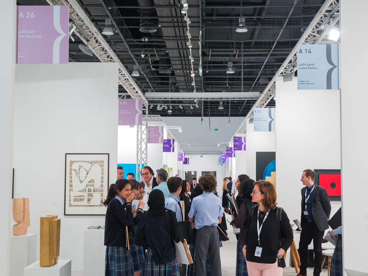 Abu Dhabi Art 2022: people touring gallery